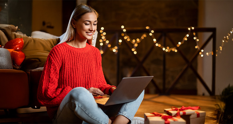 The woman wonders whether a photo book would be a good gift.