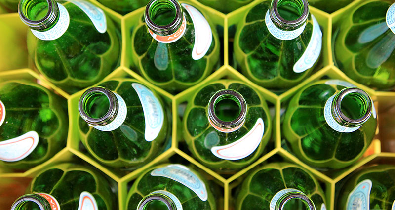 Žalieji buteliukai - dėžėje